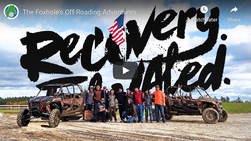 Video cover of Off-Roading Adventures. A group of men in recovery gather around some ATVs.
